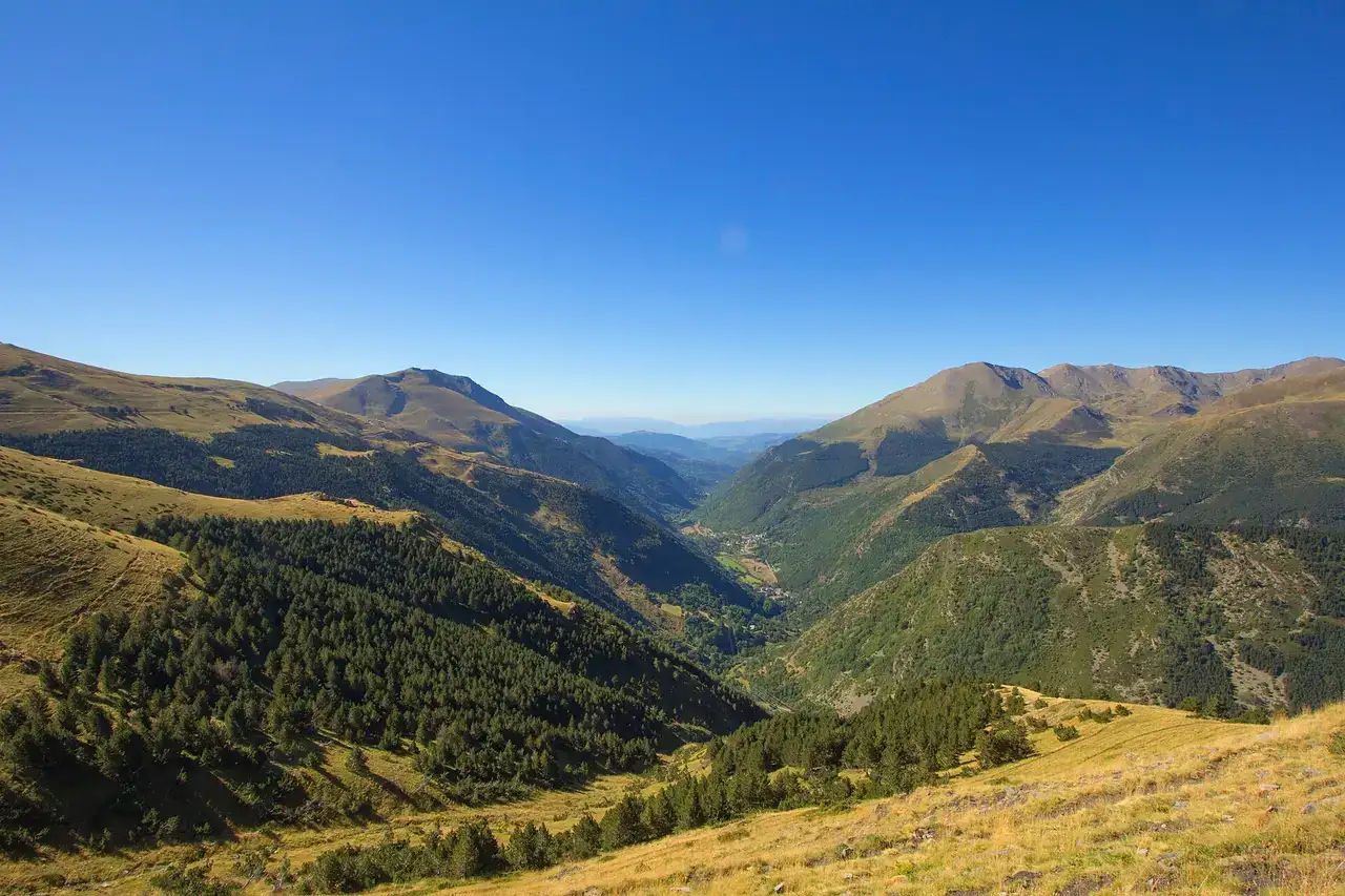 Vall Fosca general view, in the Catalan Pyrenees. At left, penstocks from the control gate to the power plant.